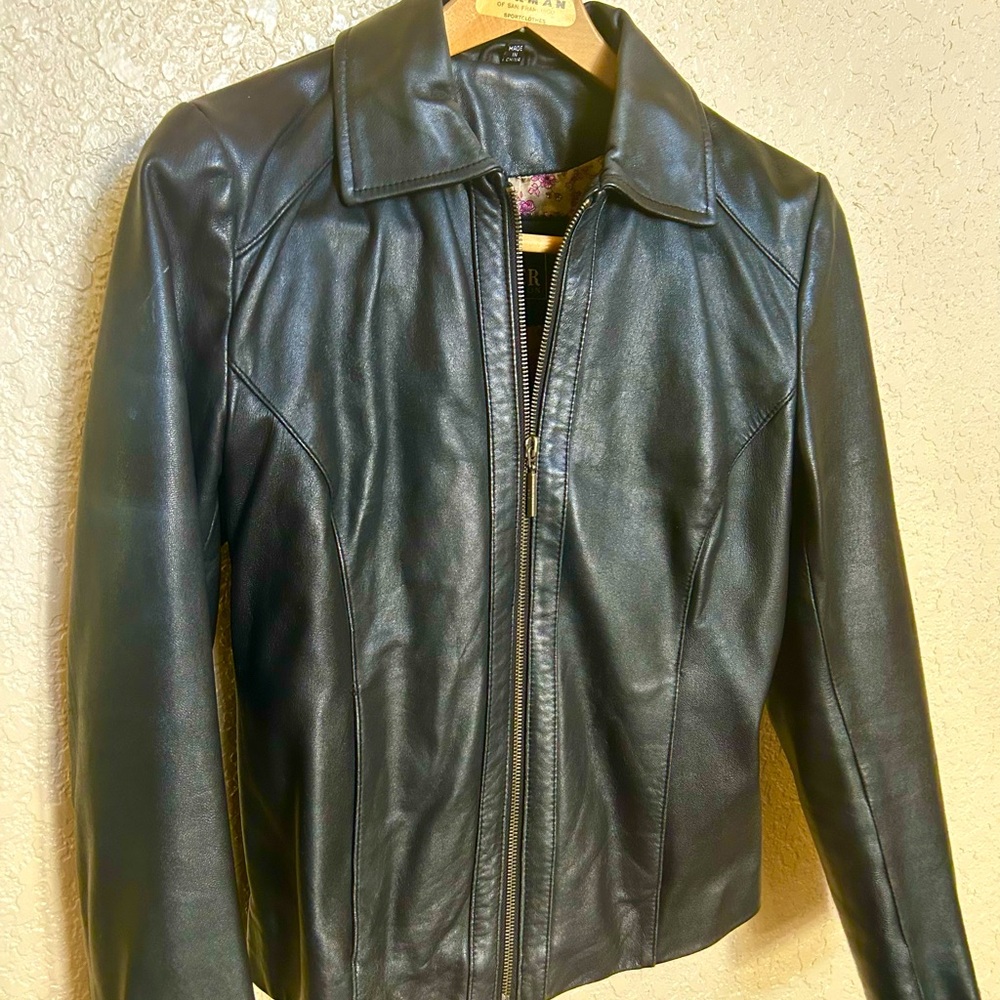 Ladies black leather jacket.